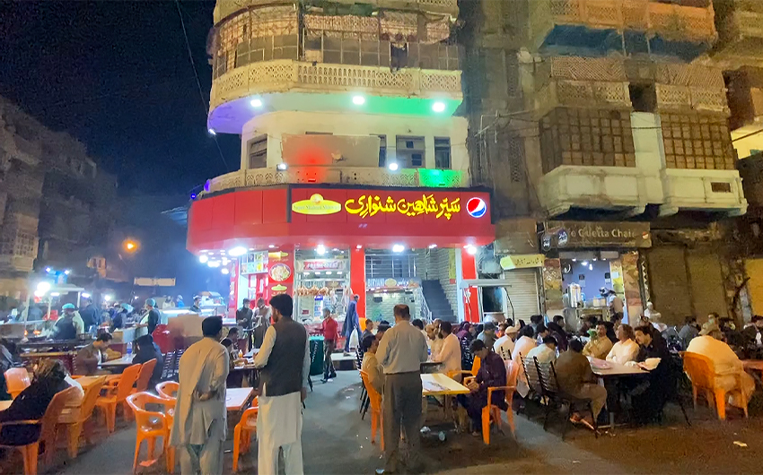 Looking up an old love, food, on a historic street in Pakistan’s