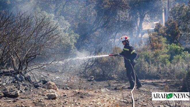 Wildfire rages on Crete as strong winds hamper firefighting