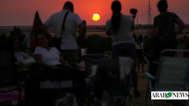 Spain darkens as solar eclipse races south from Arctic