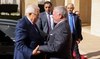 This picture shows President Mahmud Abbas (L) being welcomed by Jordan's King Abdullah II ahead of their meeting in Amman.