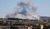 A photograph taken from the southern area of Nabatieh shows smoke rising from the site of an Israeli airstrike.