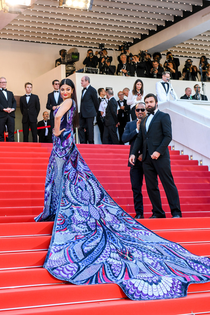 Aishwarya Rai Bachchan arrives at the Cannes Film Festival in a 'Mystical  Hood' Sophie Couture gown | Vogue India