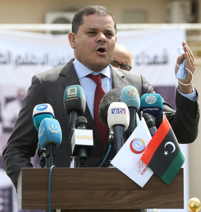 Libyan Prime Minister Abdelhamid Dbeibah delivers a speech on April 10, 2021, at the launch of the national vaccination campaign in Tripoli. (AFP / Mahmud Turkia)
