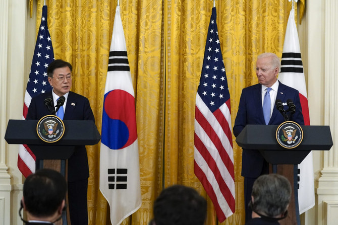 US President Joe Biden and South Korean President Moon Jae-in attending a joint news conference at the White House in Washington, D.C. on May 21, 2021. (AP Photo/Alex Brandon, File)