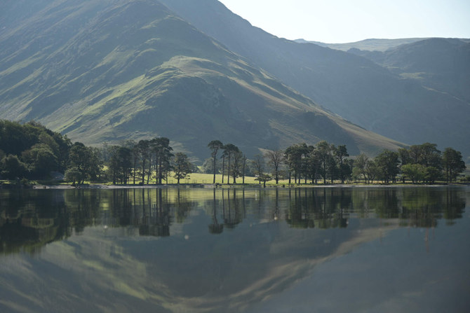 This photo taken on August 14, 2020, shows Buttermere Lake northwest England. Britain has become warmer, wetter and sunnier this century due to climate change, meteorologists say. (AFP)