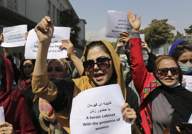 Women gather to demand their rights under the Taliban rule during a protest in Kabul, Afghanistan, on Sept. 3, 2021. (AP Photo/Wali Sabawoon)