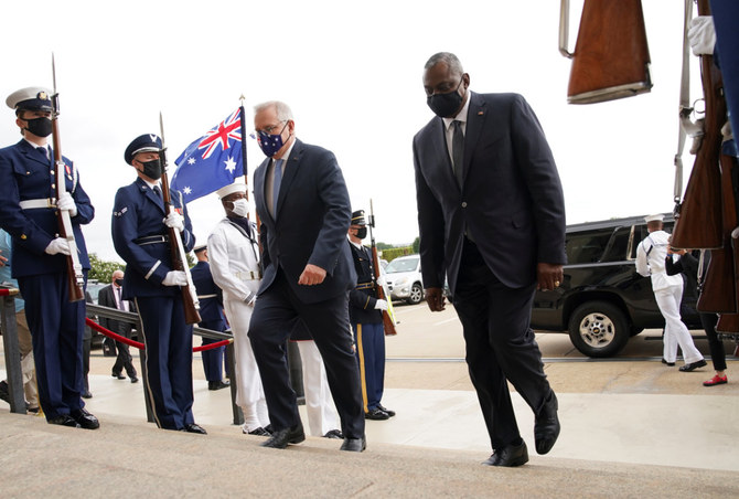 US Defense Secretary Lloyd Austin welcomes Australia's Prime Minister Scott Morrison during an honor cordon at the Pentagon in Arlington, Virginia, US, on Sept. 22, 2021. (REUTERS/Kevin Lamarque)