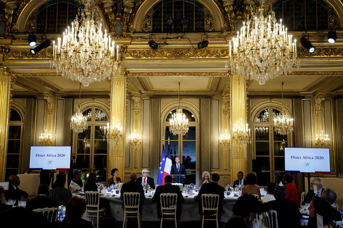 French President Emmanuel Macron delivers a speech as he hosts a dinner at the Elysee Palace on Sept. 30, 2021 as part of the closing ceremony of the Africa2020 season. (AFP)