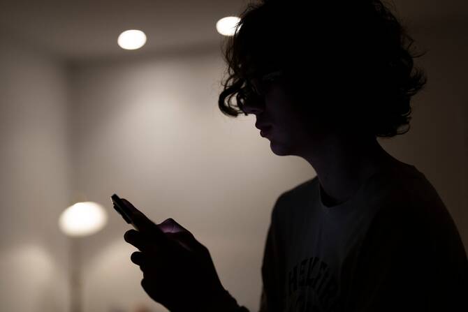 Policymakers have a responsibility to balance technological advancement with safeguarding the well-being of children (AFP)