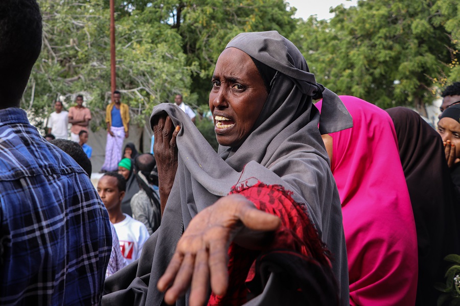 A Somali woman reacts as victims from a car bombing attack are brought to the Madina Hospital in Mogadishu, on December 28, 2019. (File/AFP)